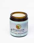 Open 4oz jar of Magnesium Unscented Sleep Cream on a white background - gentle for babies, kids & sensitive skin